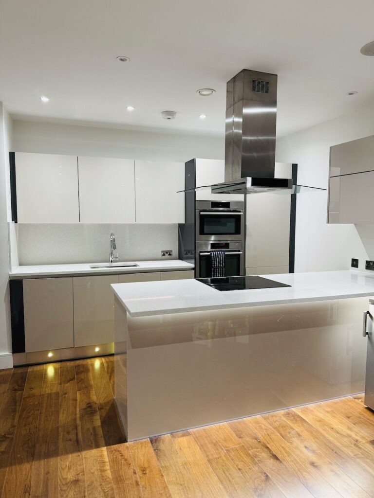 High-quality bespoke kitchen with fitted cabinets and worktops