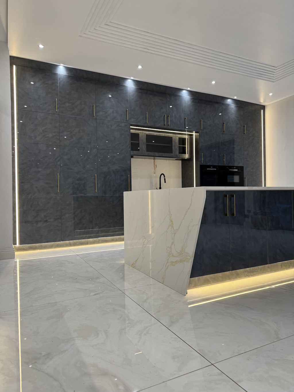 Custom kitchen installation by P&B Interiors with bespoke cabinets and modern design